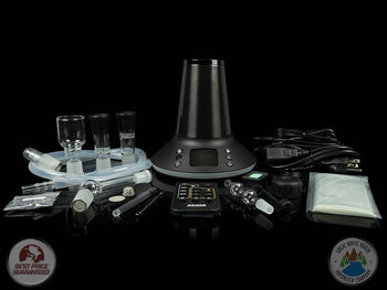 Arizer XQ2 desktop vaporizer on black background with accessories next to it.