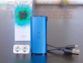 Blue Ccell Silo, with packaging in the background, standing on a table.