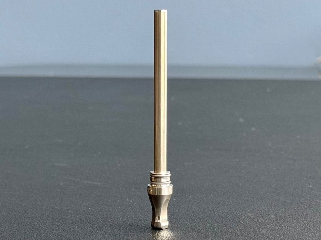 dynavap m7 condenser assembly w/mouthpiece assembled sitting on desk