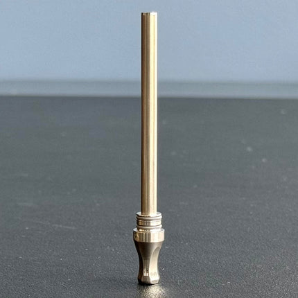 dynavap m7 condenser assembly w/mouthpiece assembled sitting on desk