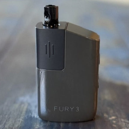Dark Grey Fury 3 portable vaporizer with sleek matte finish, emphasizing its pocket-sized profile and modern look.