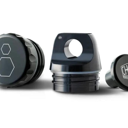 Chill Lid & Plug Set shown with top and bottom plugs for sealing the Chill Steel Pipe for leakproof travel.