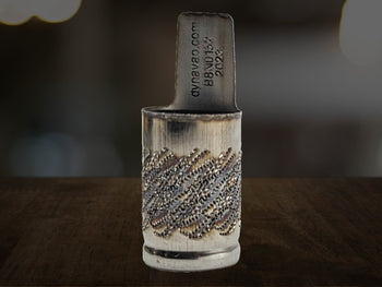 Dynavap perforated cap v2 on desk rear view