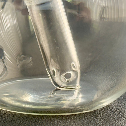 closeup of percolator on the sneaky Pete hand globe handheld bong