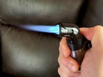 vector maxforce triple flame lighter in action with 3 converging flames visible