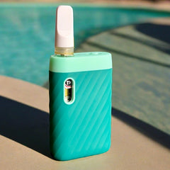ccell sandwave in marine green with cartridge inserted