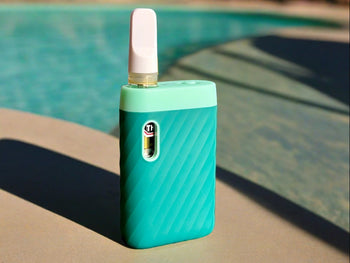 ccell sandwave in marine green with cartridge inserted