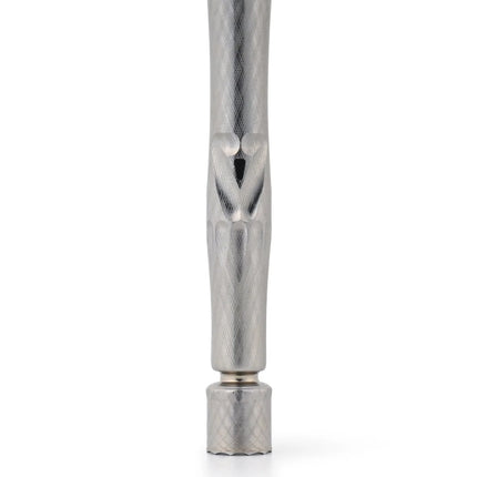 Close-up of DynaVap UniDyn Captive showing DuraDyn finish and titanium texture