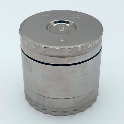 Vestratto Stash closed view — heavy-duty stainless steel debowler and herb container with magnetic lid.