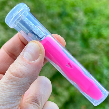 Neon pink Dynavap B Portable Vaporizer in a clear plastic case.