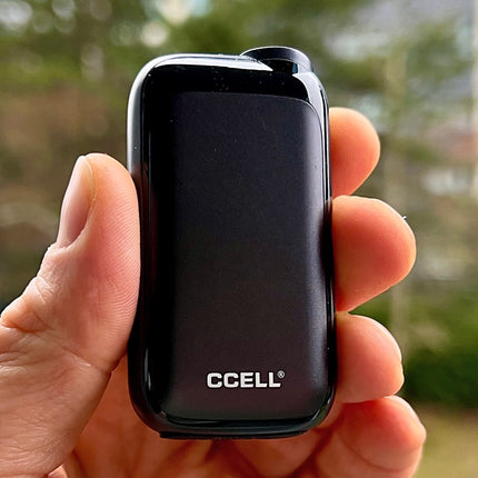 CCell Rizo in black color held in hand