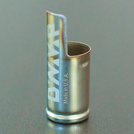 DynaVap Captive Cap on a table.