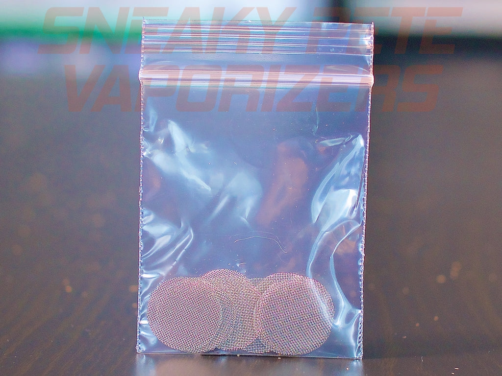 Ditanium Glass Handpiece Screens in a plastic bag on a table.