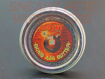 Jar of Bomb Ass Butter by Ed's TnT on a table.