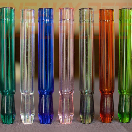 Colored Aristocrat Stems For DynaVap standing on a table.