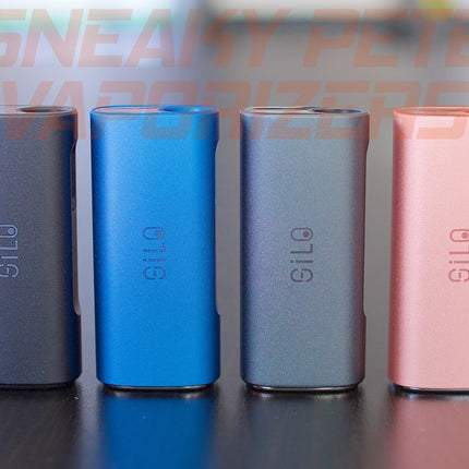 Black, blue, grey, and pink CCell Silo standing next to each other on a table.