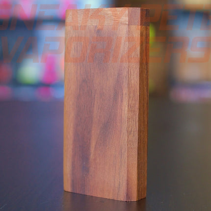 Walnut DynaStash standing on a table.
