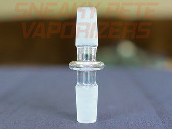 Glass 14mm Male to 14mm Male Adapter on a table.