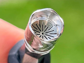 Tip of a black Dynavap B Portable Vaporizer, showing the CCDs.