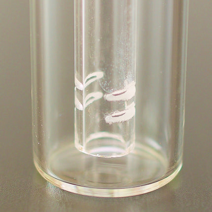 Closeup of percolator of Arizer BubbleMax on a table.
