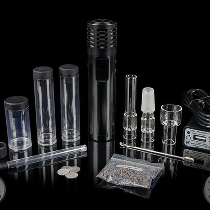 Arizer Air MAX with all accessories on black table.