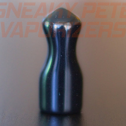 DynaVap Fat Mouthpiece standing on a table.