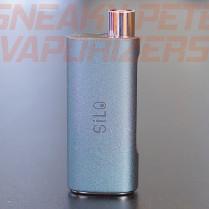 Grey Ccell Silo with cartridge inserted standing on a table.
