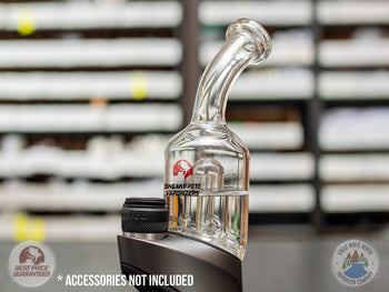 Closeup of a Bent-Neck Peak Pro Top glass piece in Puffco Peak Pro  standing on a black table.