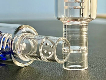 close up of glass bowl with permanent screen in arizer rocket stem  Edit alt text