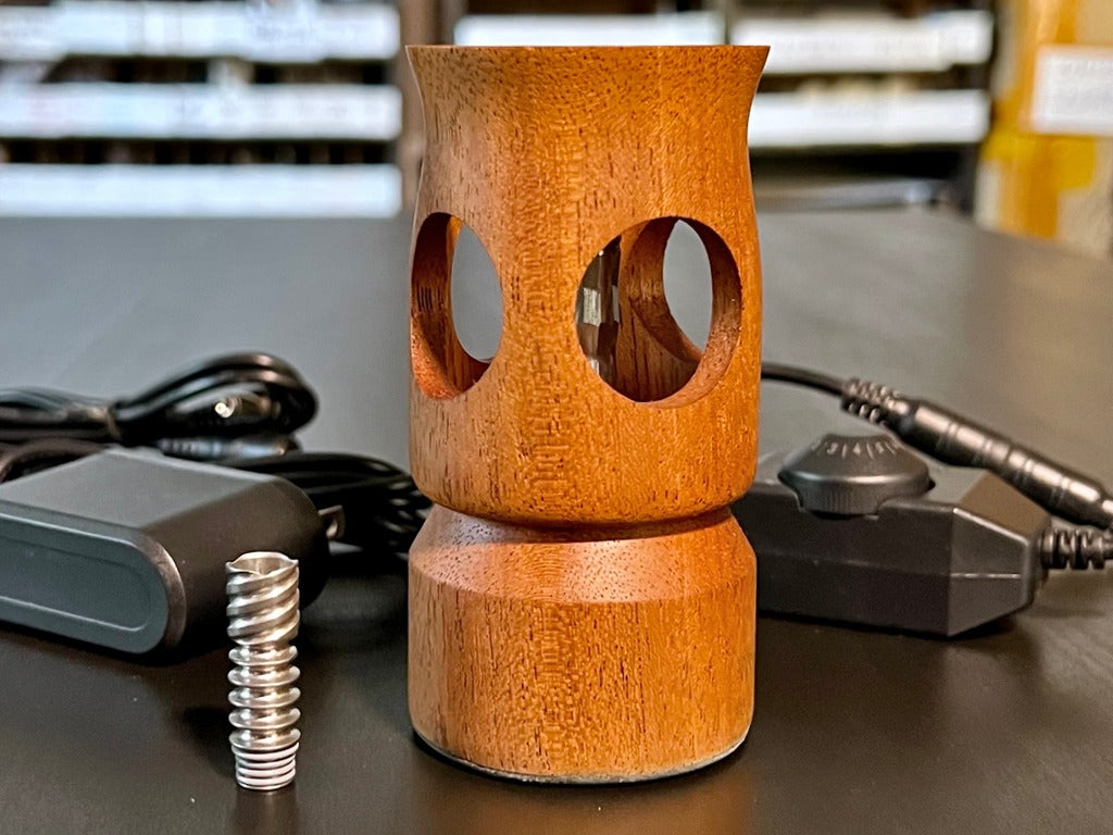The Lite Kit comes with all of the same incredible quality but at a much lower price. Same Grade 2 Titanium air path, same beautiful craftsmanship in a gorgeous Mahogany wood choice, same exquisite vaping experience. The difference is that this stripped down package excludes all the accessories you may never need, allowing you to build your own kit on a budget.