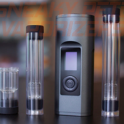 Black Arizer Solo 2 portable dry herb vaporizer with accessories standing on a table.  