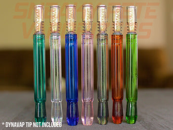 Colored Aristocrat Stems For DynaVap with Dynavap Tips inserted standing on a table.