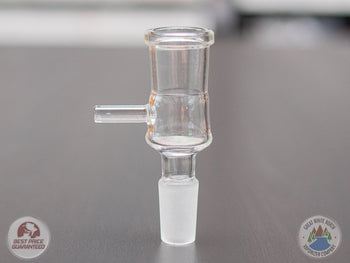 Glass 18mm Female to 14mm Bale Injector Bowl on a table.