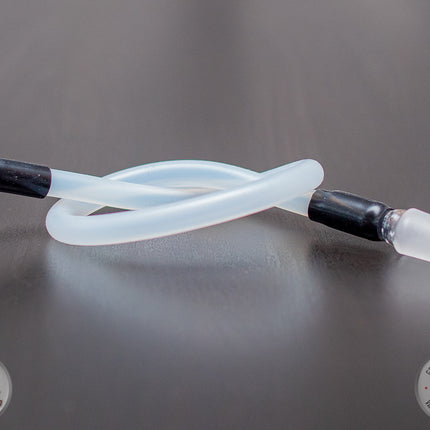 Crafty+/Mighty+/DynaVap 14mm Whip Adapter on a table.
