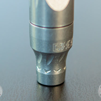 Bottom of a DynaVap VonG (i) Portable Vaporizer on a table.