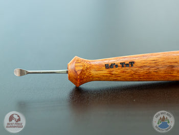 Ed's TNT Pack & Stir Tool on a table.