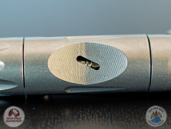 Air port of a DynaVap VonG (i) Portable Vaporizer on a table.